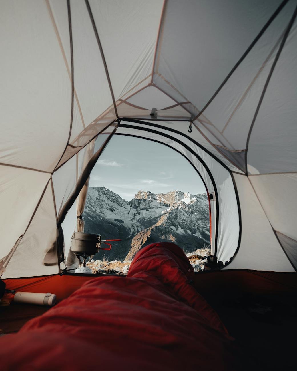 sleeping in a tent high in the mountains