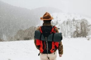 a man walking on the snow